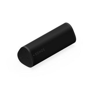 Sonos Roam 2 Portable Speaker Black laying horizontal front angle top down view against a white background.