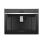 Black built-in coffee machine on a black background