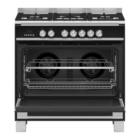 Black range cooker with open oven door on a white background
