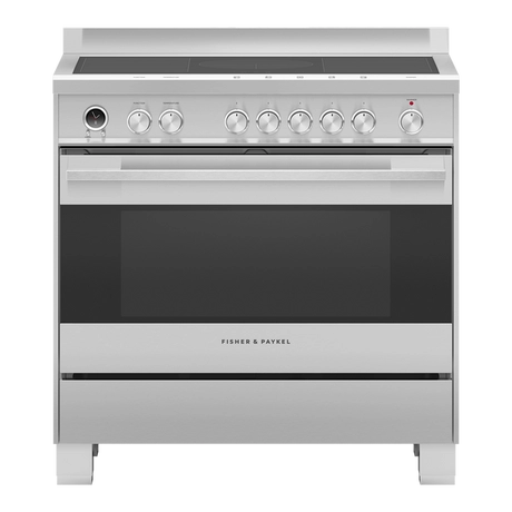 Stainless steel induction range cooker with manual controls on a white background