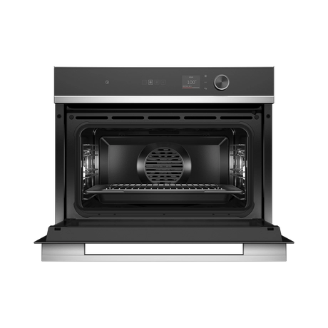 Black oven with open door on a white background