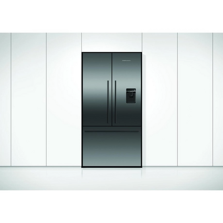 Stainless steel refrigerator with ice maker in a kitchen setting