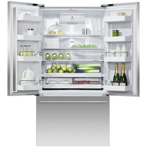 Open refrigerator with various food items on a white background