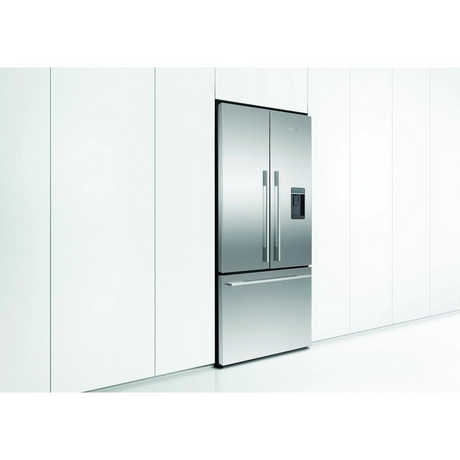Stainless steel refrigerator in a modern kitchen setting