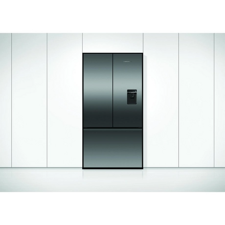 Stainless steel refrigerator with water and ice dispenser in a modern kitchen setting