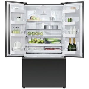 Open refrigerator with various food items inside on a white background