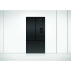 Black refrigerator in a modern kitchen with white cabinets