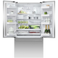 Open refrigerator with various food items inside on a white background