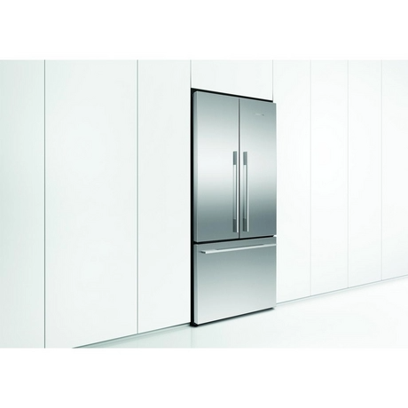Stainless steel refrigerator in a modern kitchen setting