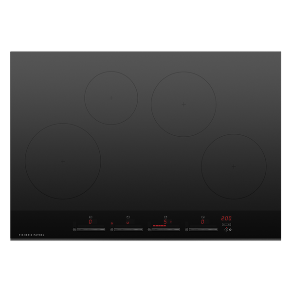 Black induction cooktop with four heating zones on a white background