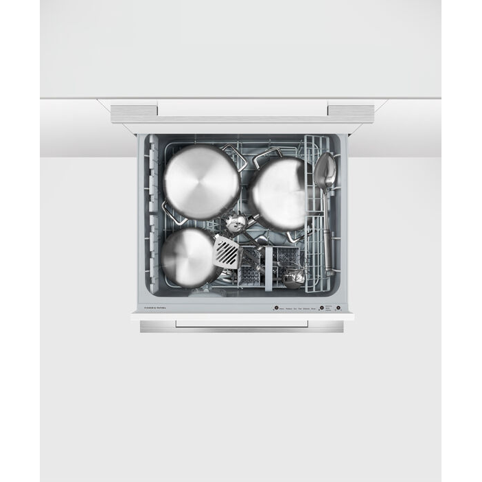 Built-in dishwasher with silverware and and pans inside on a white background