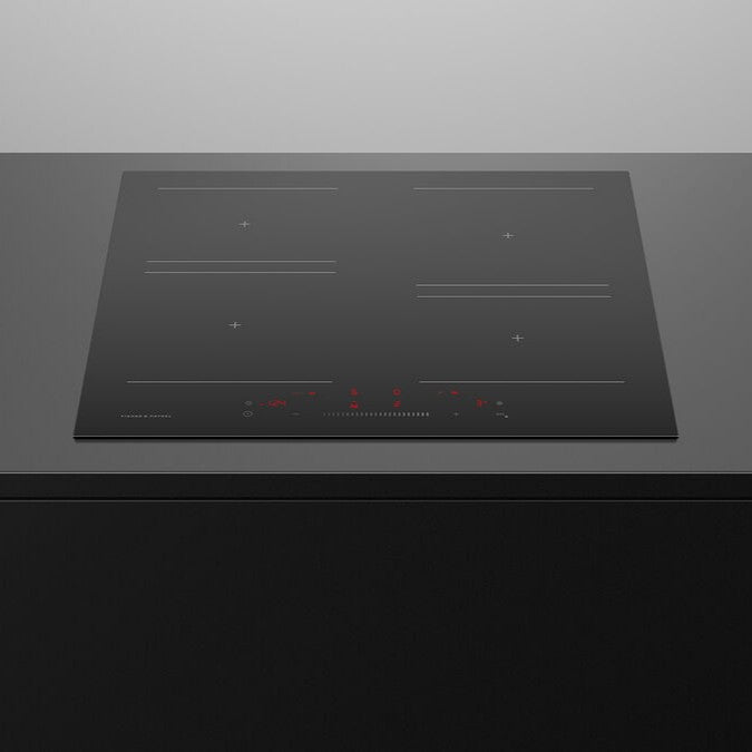 Black induction cooktop on a grey countertop